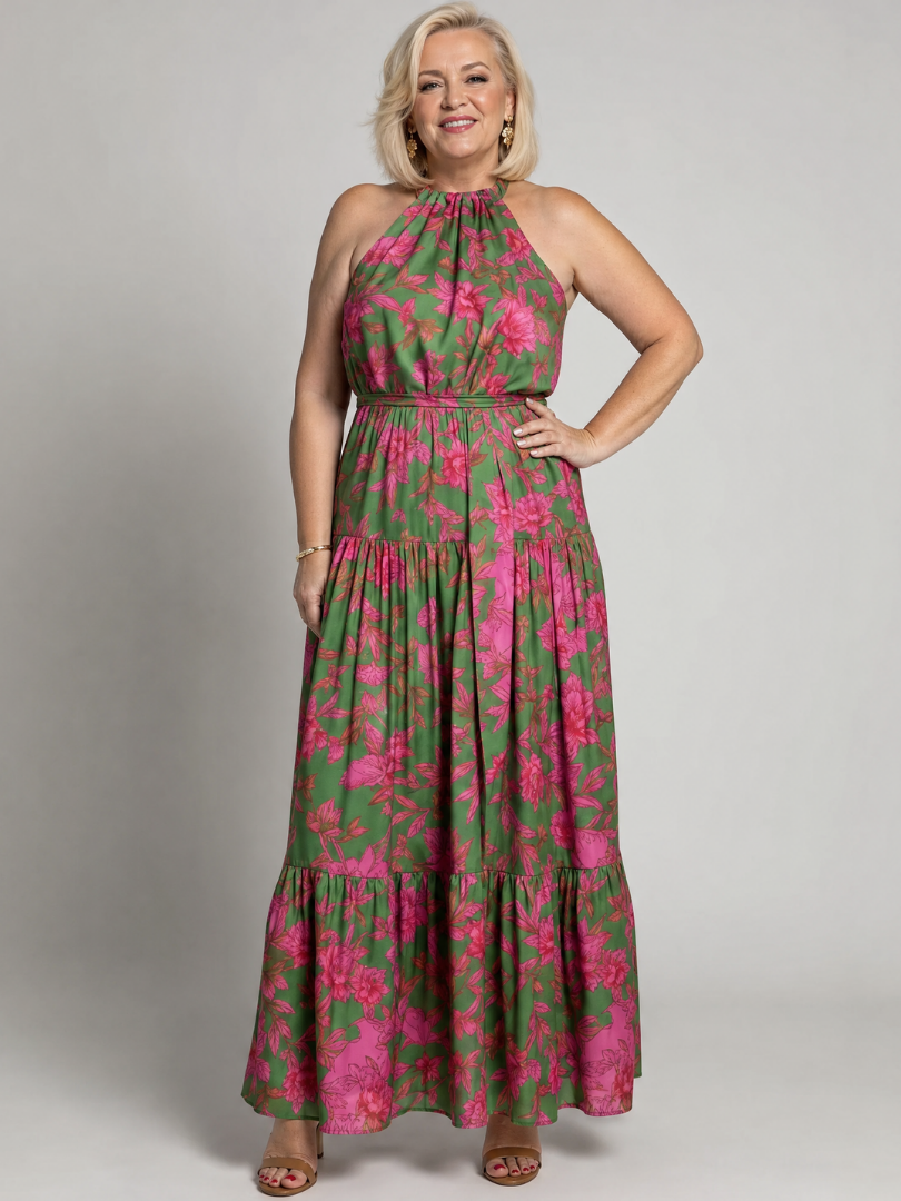 Tailliertes Halter-Midi-Kleid mit pinken Blumenprints auf grünem Stoff, geraffter Rock