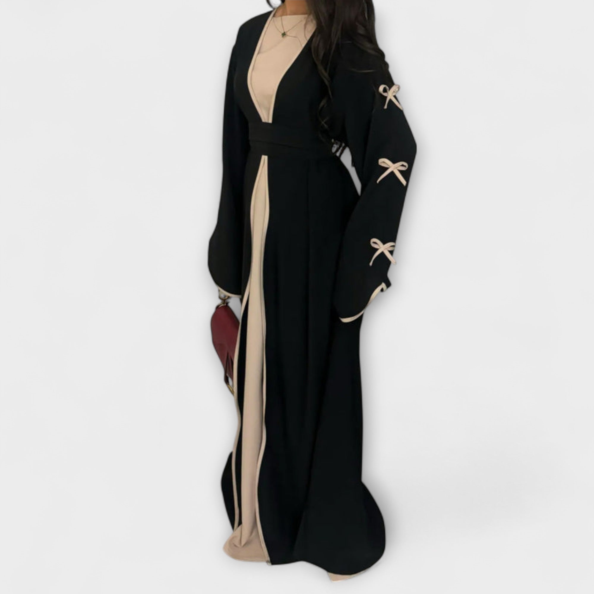 Cardigan-Kleid Duo in Schwarz mit Schleifenverzierung, beiger Einsatz und Taillengürtel