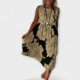 Geblümtes Midi-Kleid, ärmellos, Stufenrock, beiger Grund mit dunklem Muster