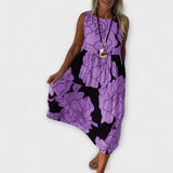 Geblümtes Midi-Kleid, ärmellos, Stufenrock, lila mit dunklem floralen Muster
