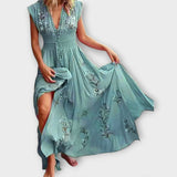 Boho-Kleid in Türkisblau mit Stickereien, V-Ausschnitt und ärmellosem Schnitt