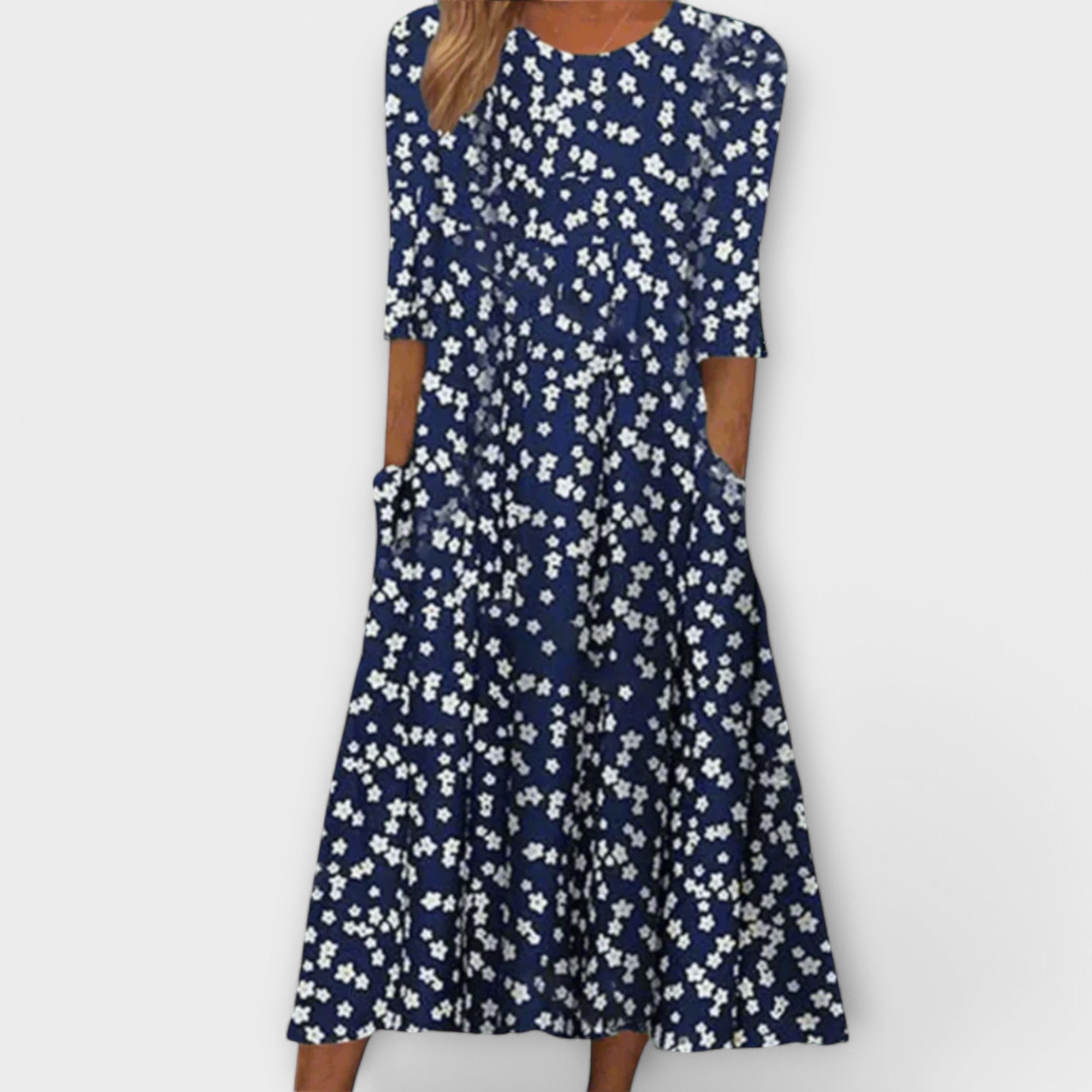 Elegantes Blumenkleid dunkelblau mit weißem Blümchenmuster, ausgestellter Rock