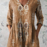 Lange Leinenbluse in Beige mit V-Ausschnitt, 3/4 Ärmeln und floralem Blockdruck