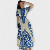 Delilah Vintage-inspiriertes Kleid, cremefarben mit blauem Muster, geschürzte Taille