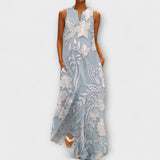 Maxikleid ohne Ärmel mit botanischem Blumenprint, blauem Grund