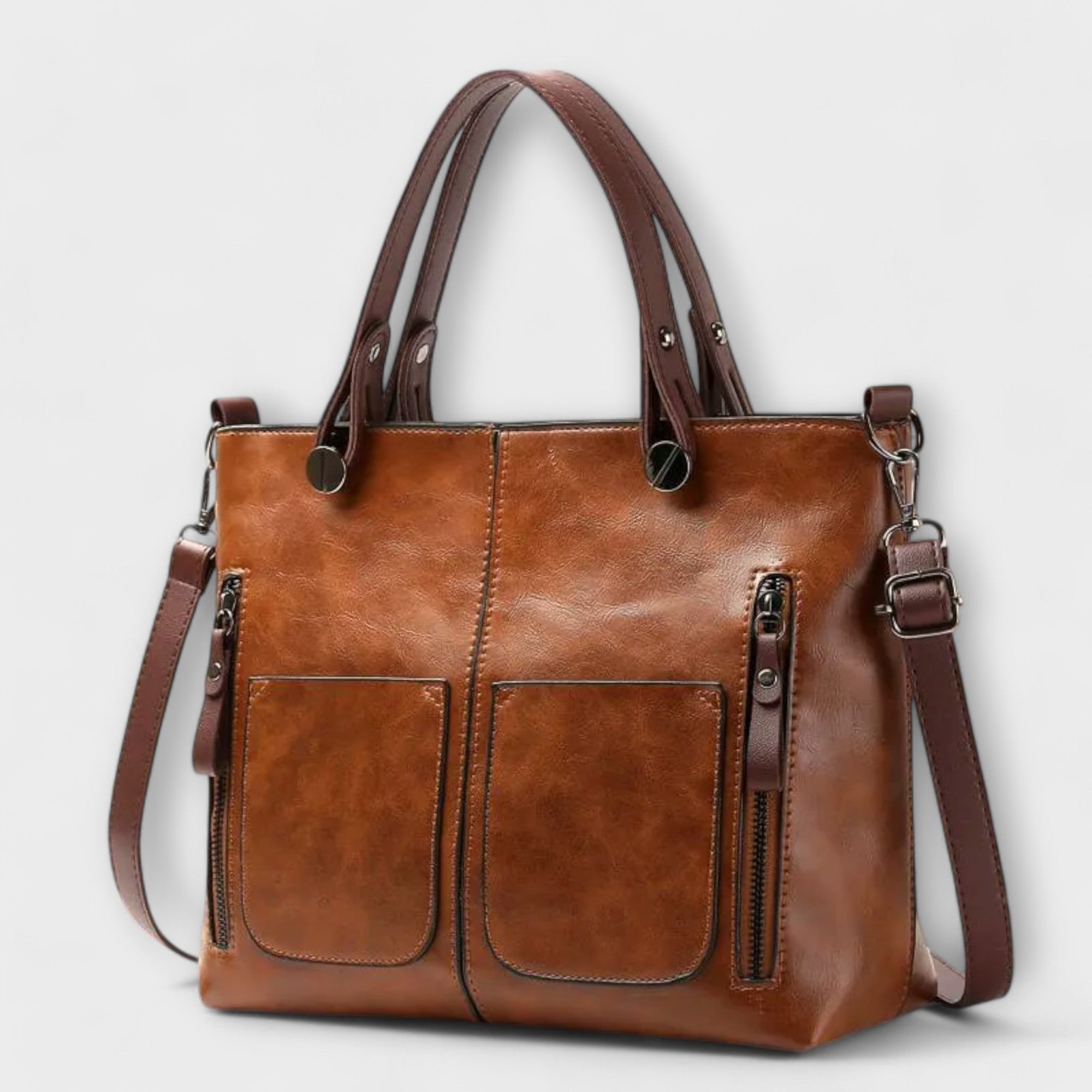 Auriane Lederhandtasche braun mit zwei Fronttaschen und Reißverschlüssen, Tragegriffen & Schultergurt