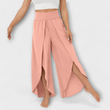 Damenhose in Rosa mit elastischem Bund, weitem Schnitt und seitlichem Schlitz