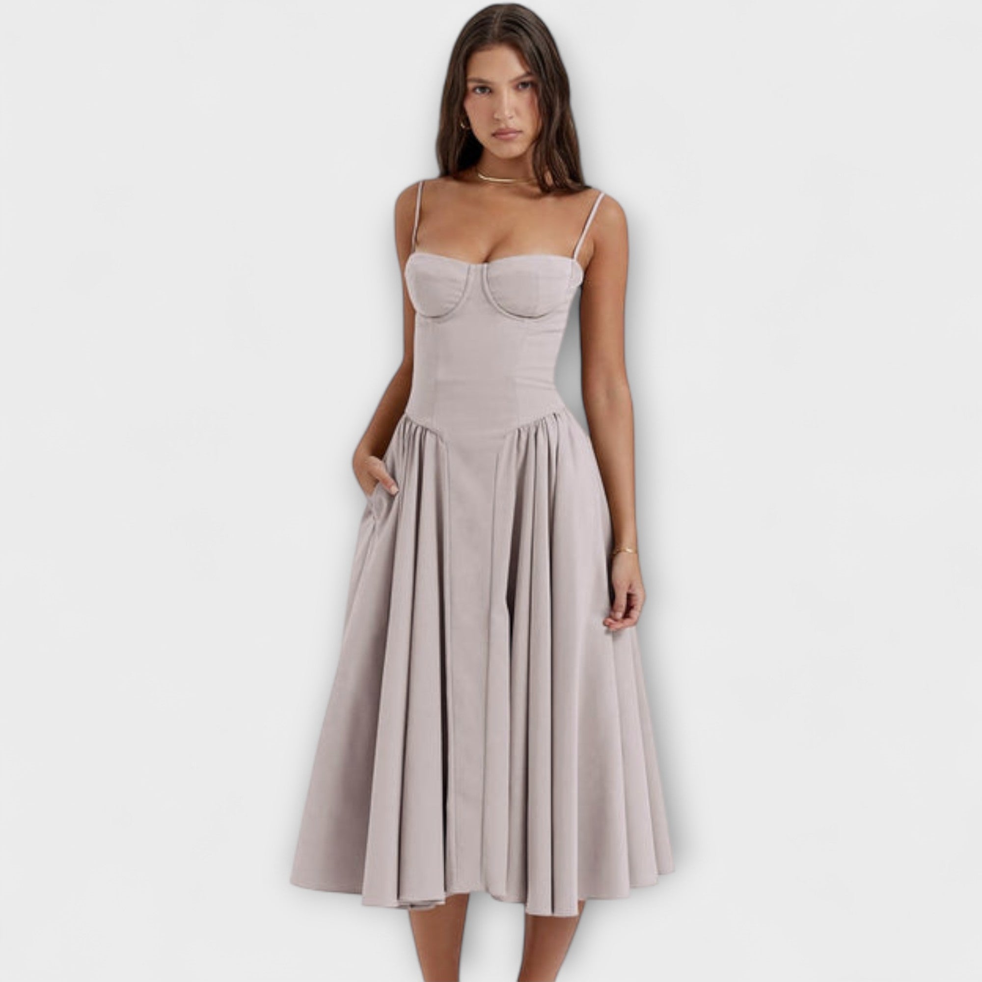 Grau-beiges ärmelloses Korsettkleid mit Trägern und plissiertem Midirock