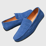 Blaue Veloursleder-Slipper im Mokassin-Stil mit Lasche und Ziernähten