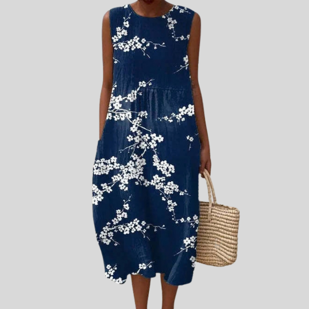 Ärmelloses Kleid in Dunkelblau mit weißem Blumenmuster, Rundhalsausschnitt und weitem Rock