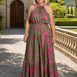 Tailliertes Halter-Midi-Kleid mit pinken Blumenprints auf grünem Hintergrund, ärmellos
