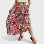 Midi-Rock mit Paisley-Muster in Rot und Beige, elastischer Bund, seitlicher Schlitz