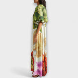 Asymmetrisches Floral-Maxikleid mit Grün-Print und Creme-Basis, lockerer 1-Schulter-Optik