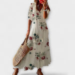 Damen-Sommerkleid mit weißem Blumenmuster, fließende Silhouette, kurze Ärmel