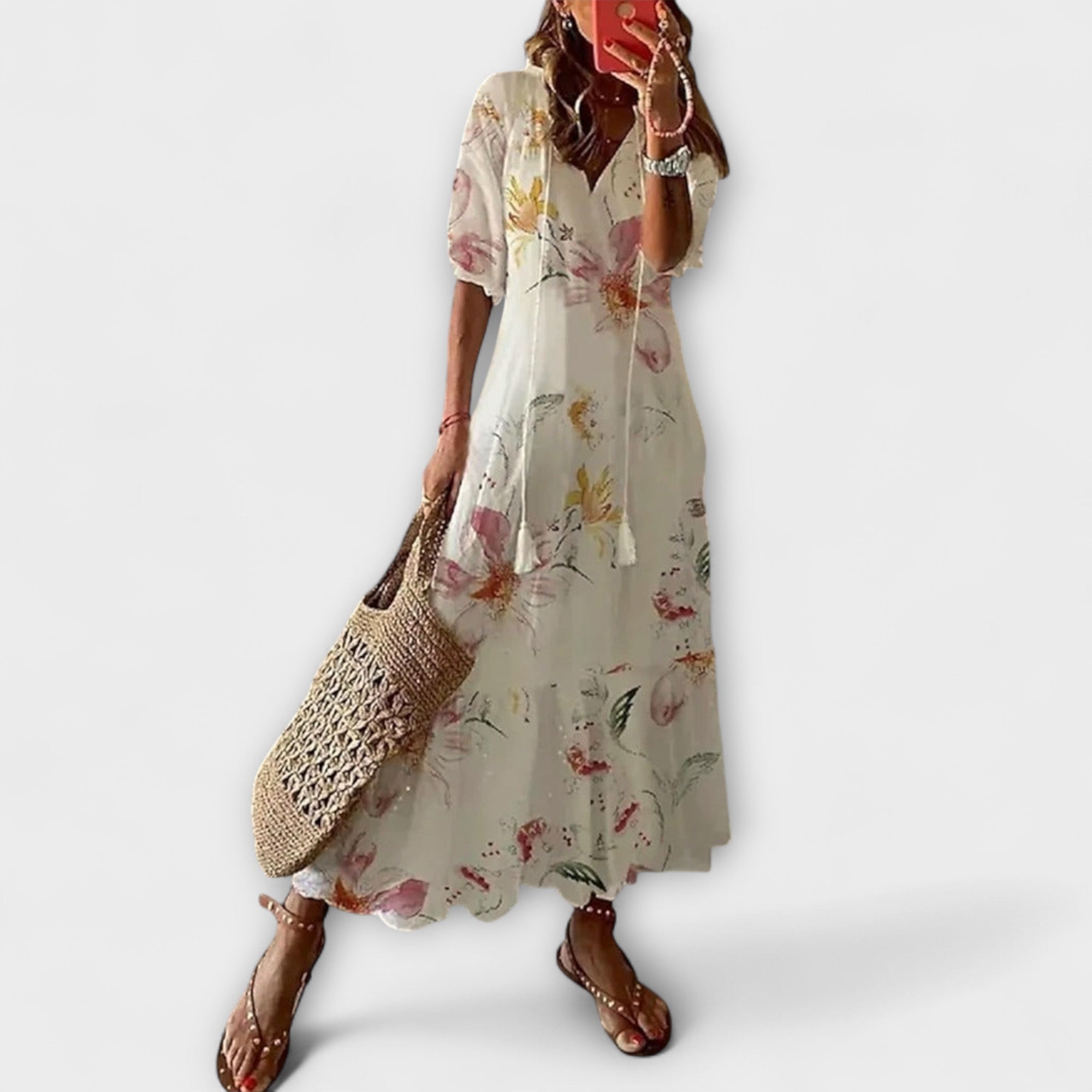Damen-Sommerkleid mit floraler Musterung, fließende Silhouette, kurze Ärmel
