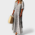 Graues Maxikleid mit V-Ausschnitt, Knopfleiste und Allover-Muster, locker fallend