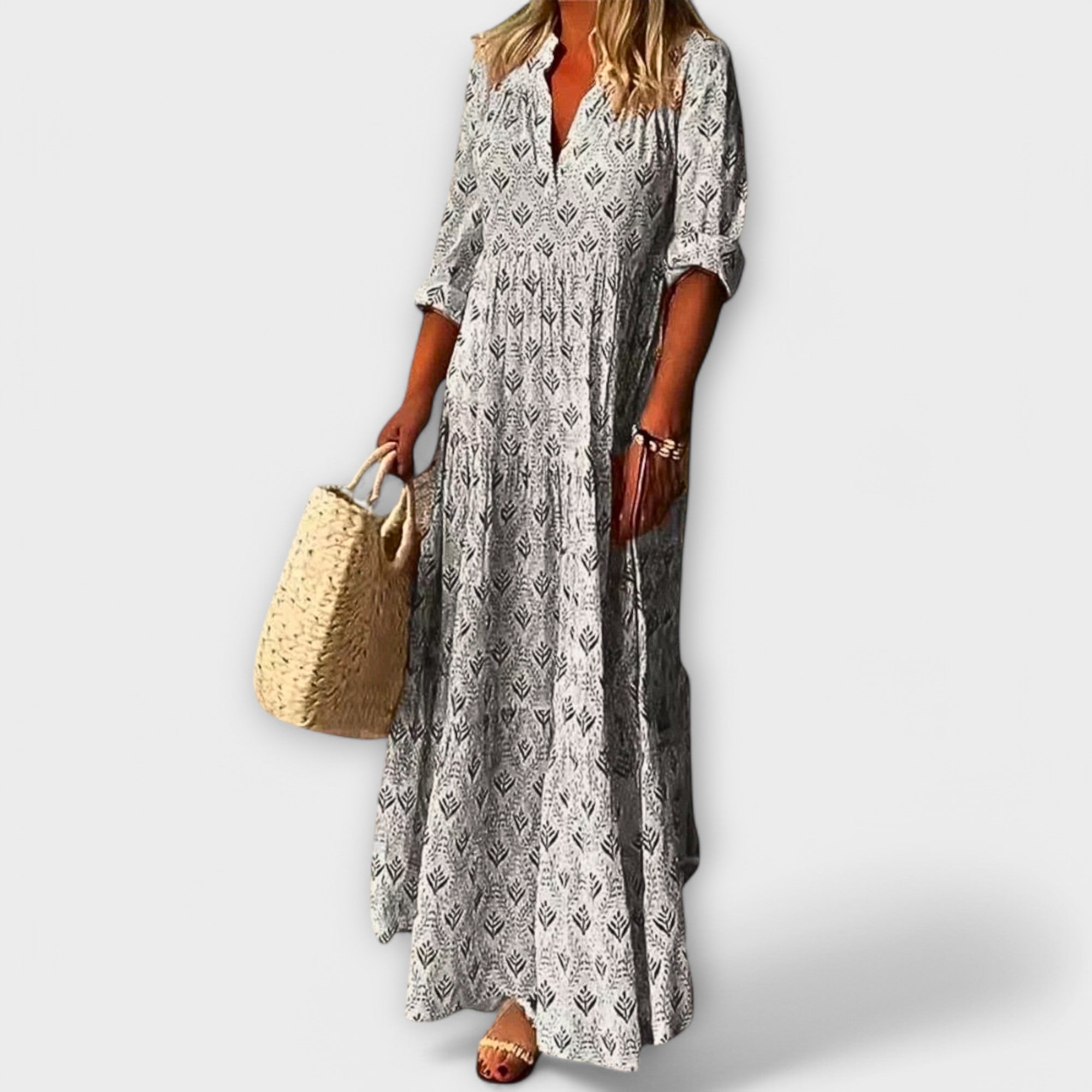 Graues Maxikleid mit V-Ausschnitt, Knopfleiste und Allover-Muster, locker fallend