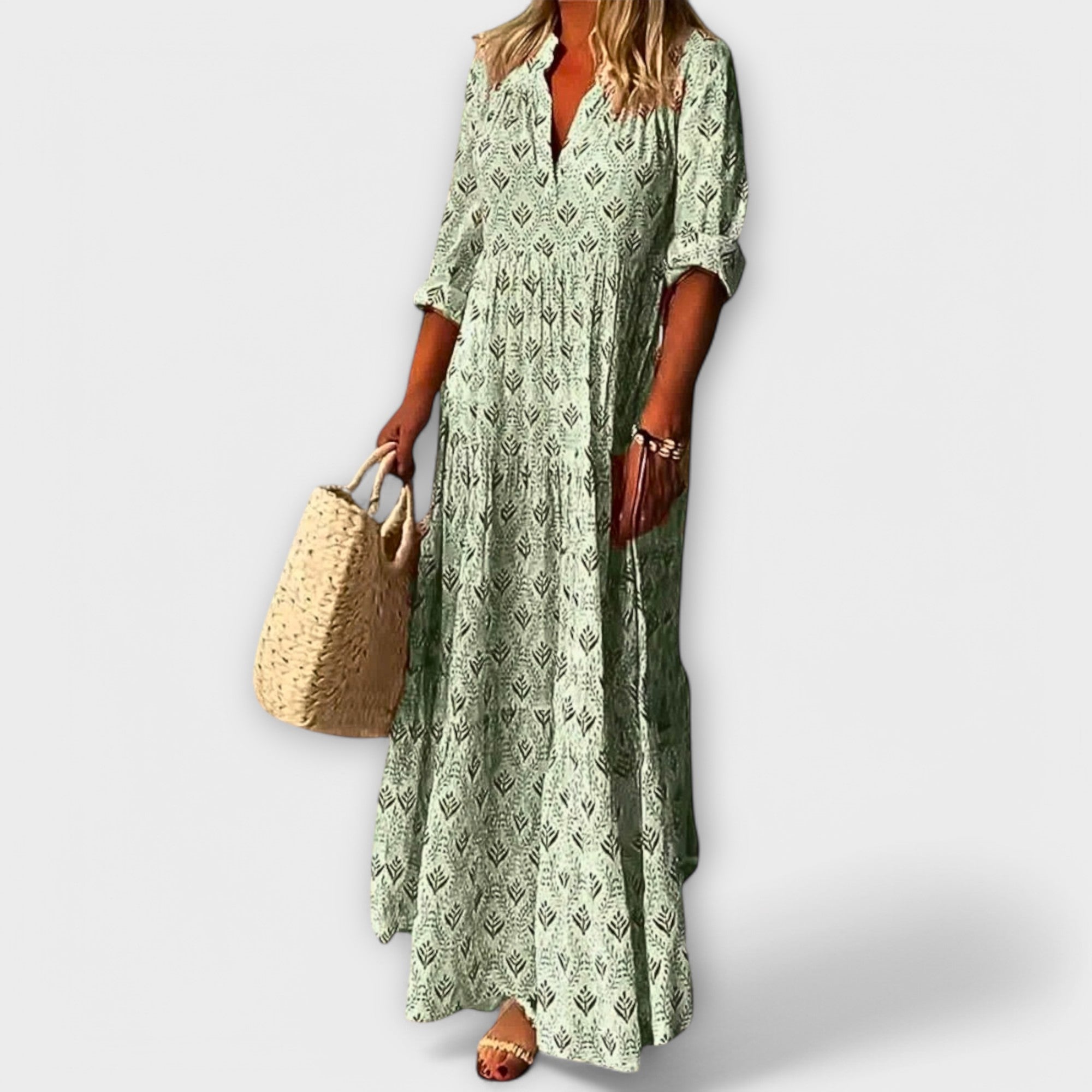 Grünes Maxikleid mit V-Ausschnitt, Knopfleiste und Allover-Muster, locker fallend