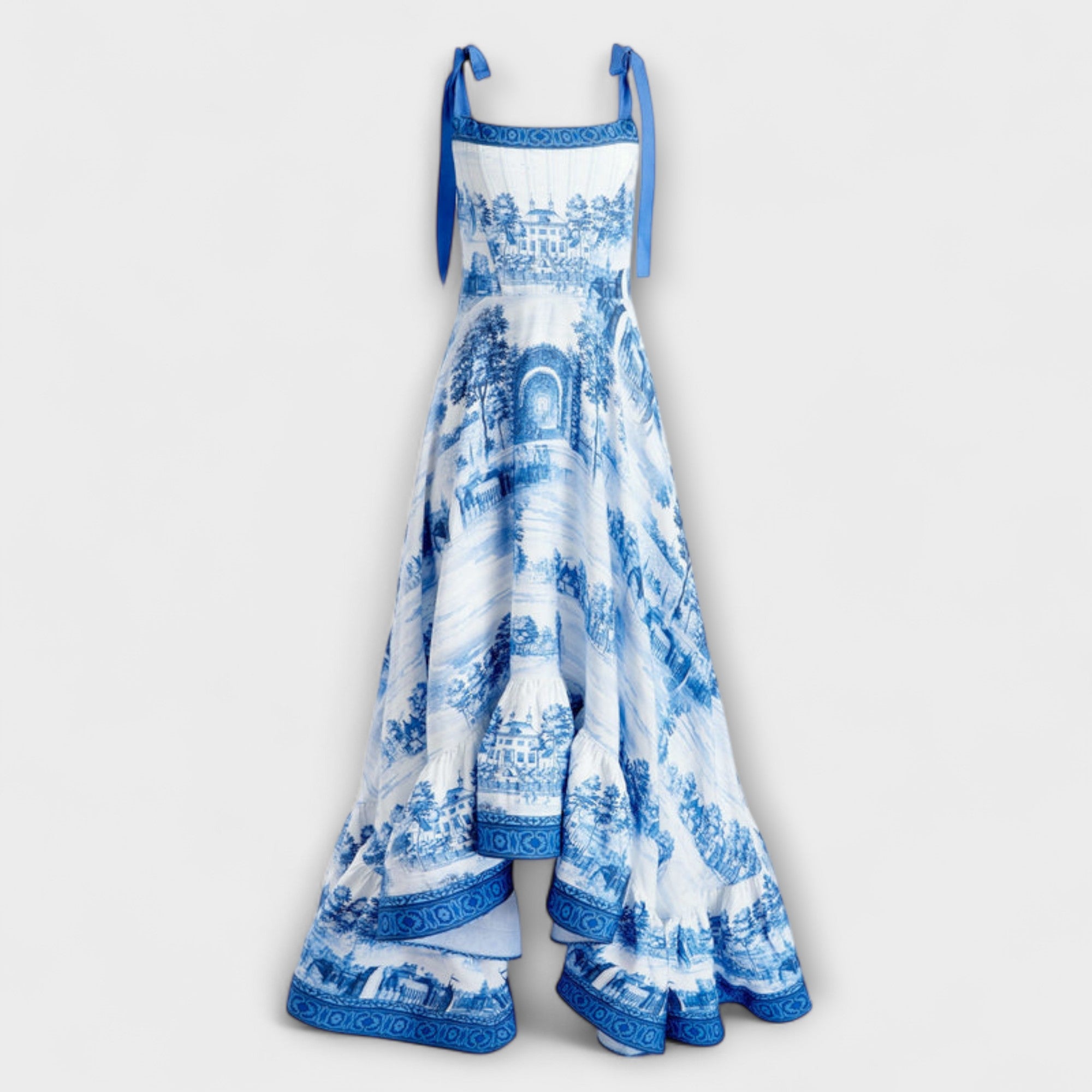 Maxikleid aufrecht abgebildet: Träger mit Schleifen, blau-weißes Muster, Volant-Saum