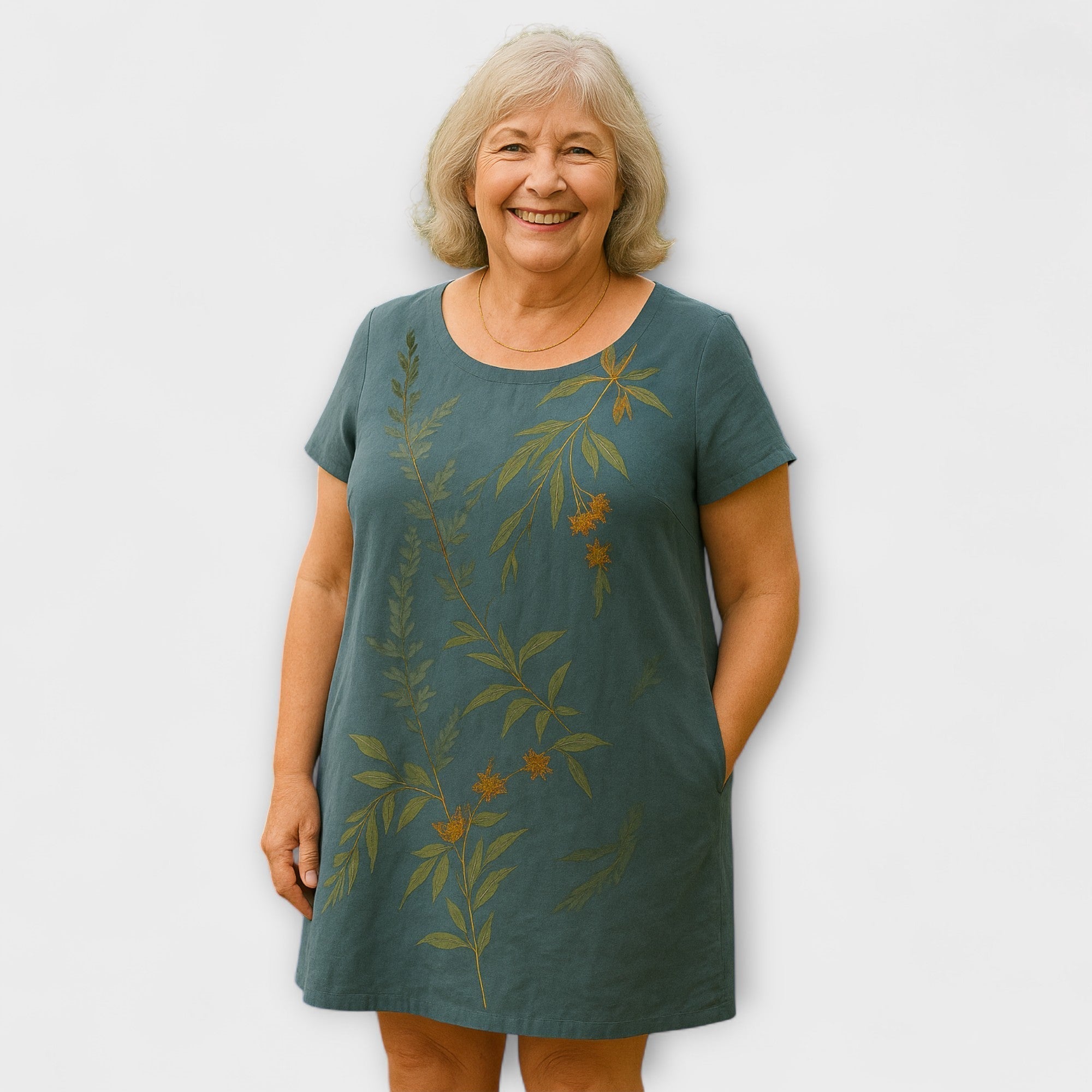 Willow Breeze-Kleid in Petrolgrün mit großem Blattprint und kurzen Ärmeln, knielang
