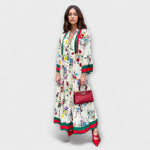 Maxikleid mit floralen Print, dreiviertel Ärmel und Saumstreifen in Grün/Rot
