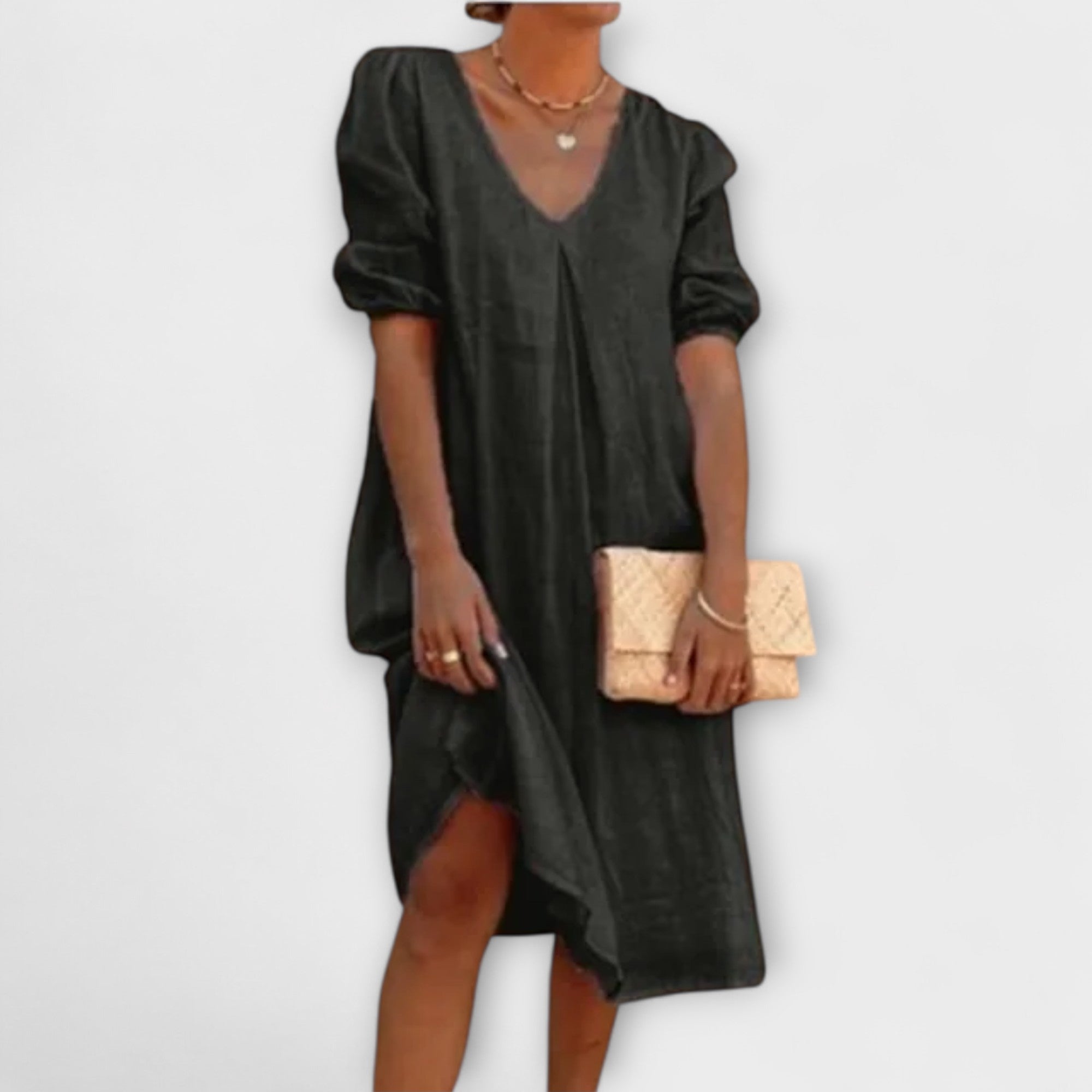 Schwarzes Sommerkleid mit V-Ausschnitt und lockeren Puffärmeln, knielang, weiter Saum