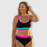 Bauchfreier Bikini-Set, schwarz mit pinken, türkisfarbenen und gelben Streifen