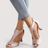 Elegante rosa Sandalen mit Riemchen, offener Zehenpartie und mittlerem Absatz