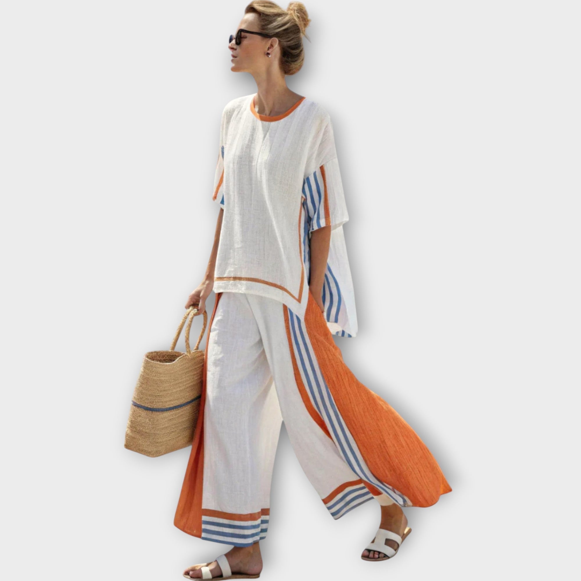 Zweiteiliges Set: weißes Tunikaoberteil mit orange-blauen Streifen, weite Hose