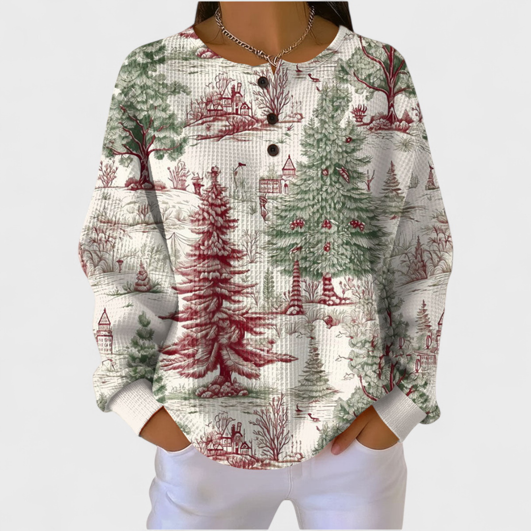 Gemusterter Rundhals-Pullover mit Weihnachtswald-Motiv in Rot und Grün, lange Ärmel
