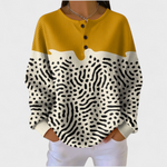 Longsleeve mit Knopfleiste, zweifarbig gelb und schwarz-weißem Zebra-Muster