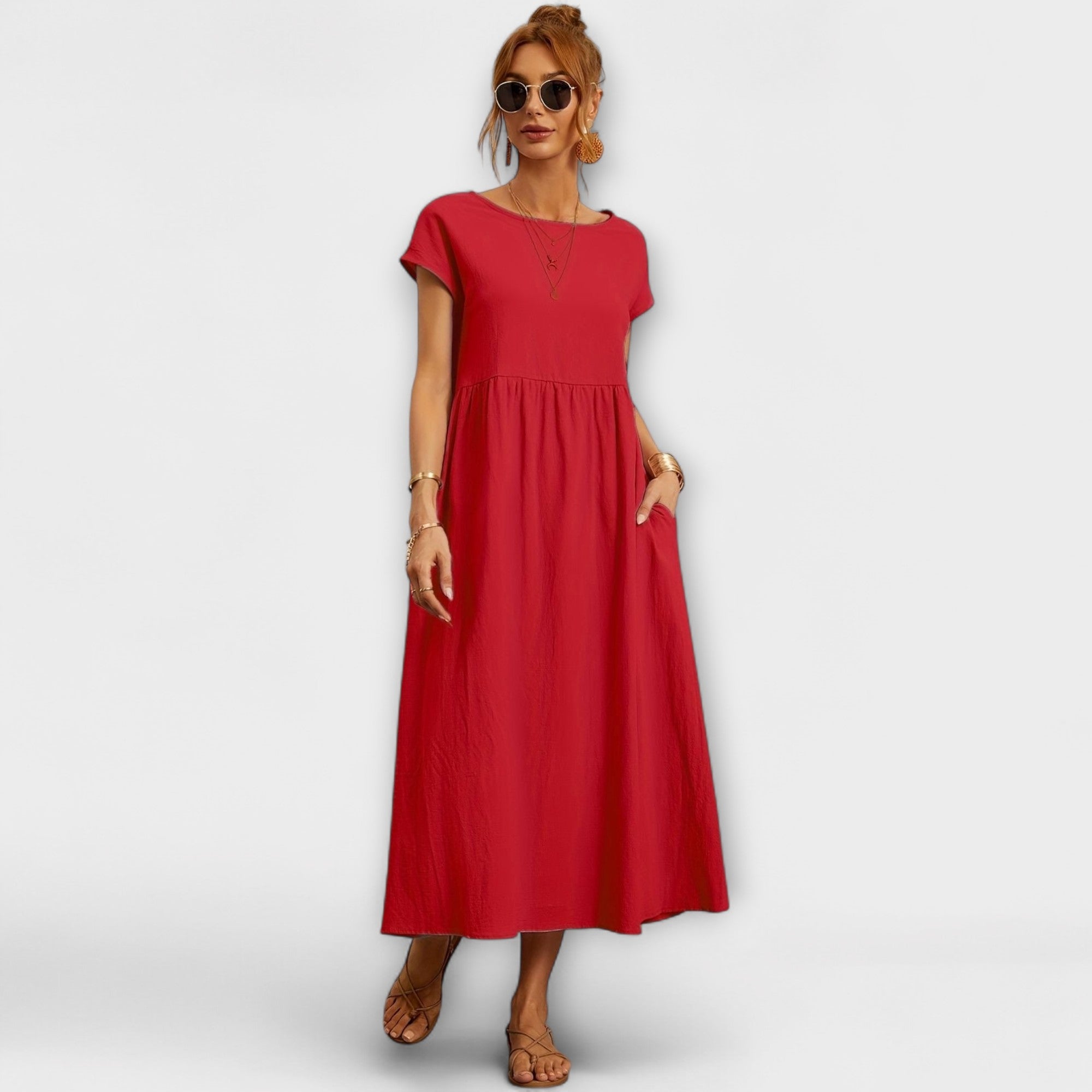 Rotes Kleid mit kurzen Ärmeln, Rundhalsausschnitt und gerafftem Faltenrock