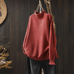 Roter Grobstrick-Pullover mit Stehkragen und geripptem Ärmelbündchen