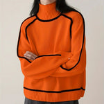 Rollkragenpullover in Orange mit schwarzen Kontrastbündchen und geripptem Saum