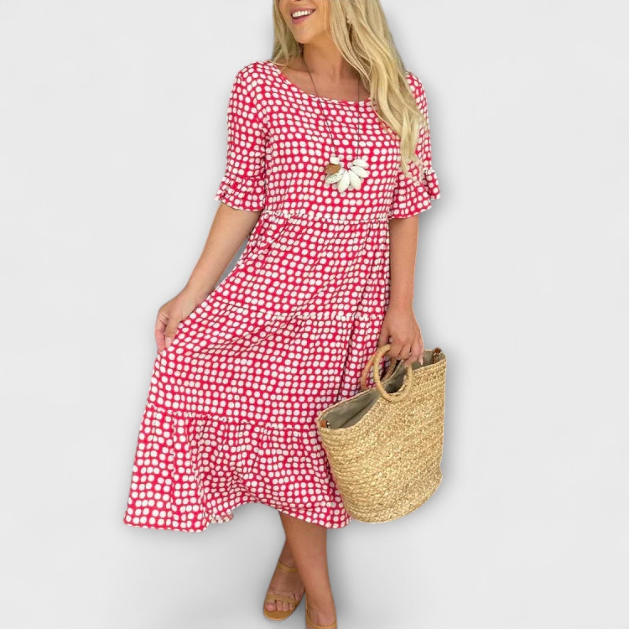 Lässiges Midi-Kleid mit roten Punkten, kurze Ärmel, gestufter Saum und Blumenapplikation