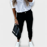 Schwarze Stretchhose, schmal zulaufend mit Taschen und elastischem Knöchel-Bündchen