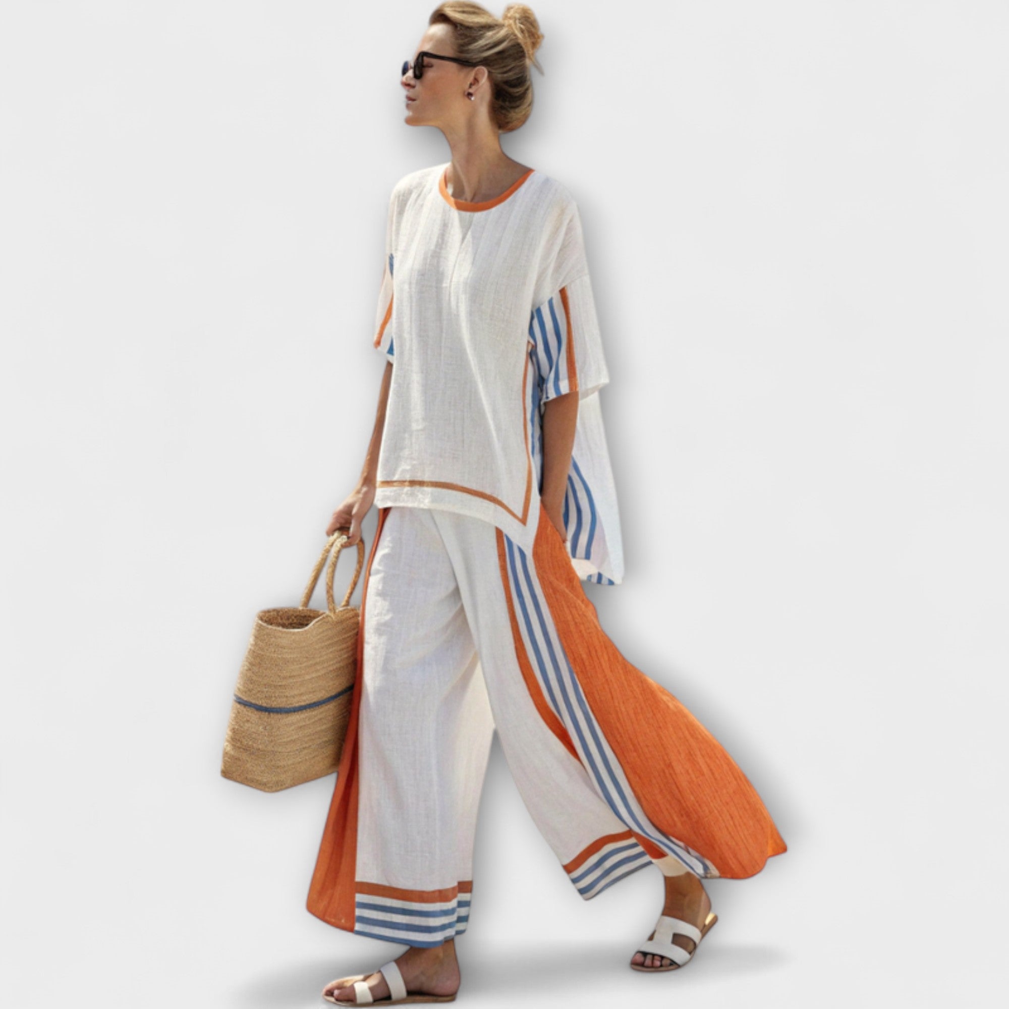 Zweiteiliges Ethnisches Set: weiße Tunika mit orange-blauen Streifen, dazu Hose