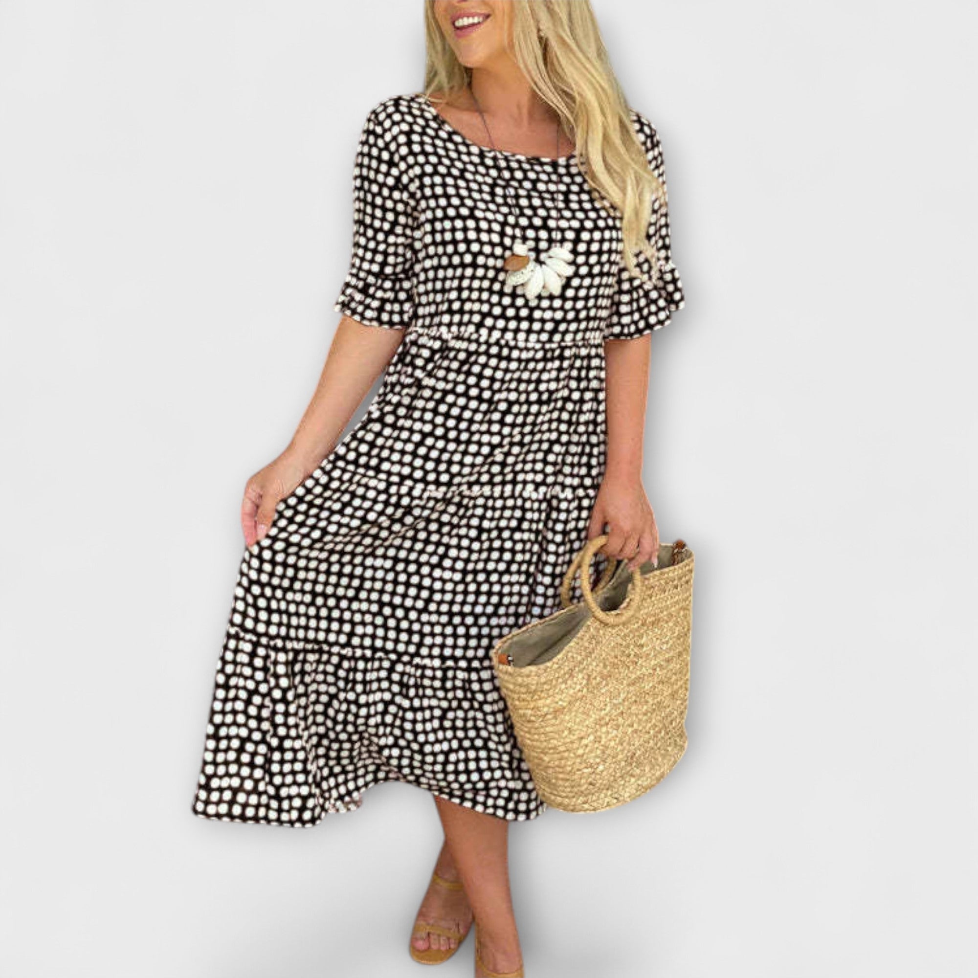 Lässiges Midi-Kleid mit Punkten, kurze Ärmel, gestuftem Rock und Blumenapplikation
