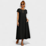 Leichtes Sommerkleid in Schwarz mit kurzen Ärmeln und Taschen, locker fallender Schnitt