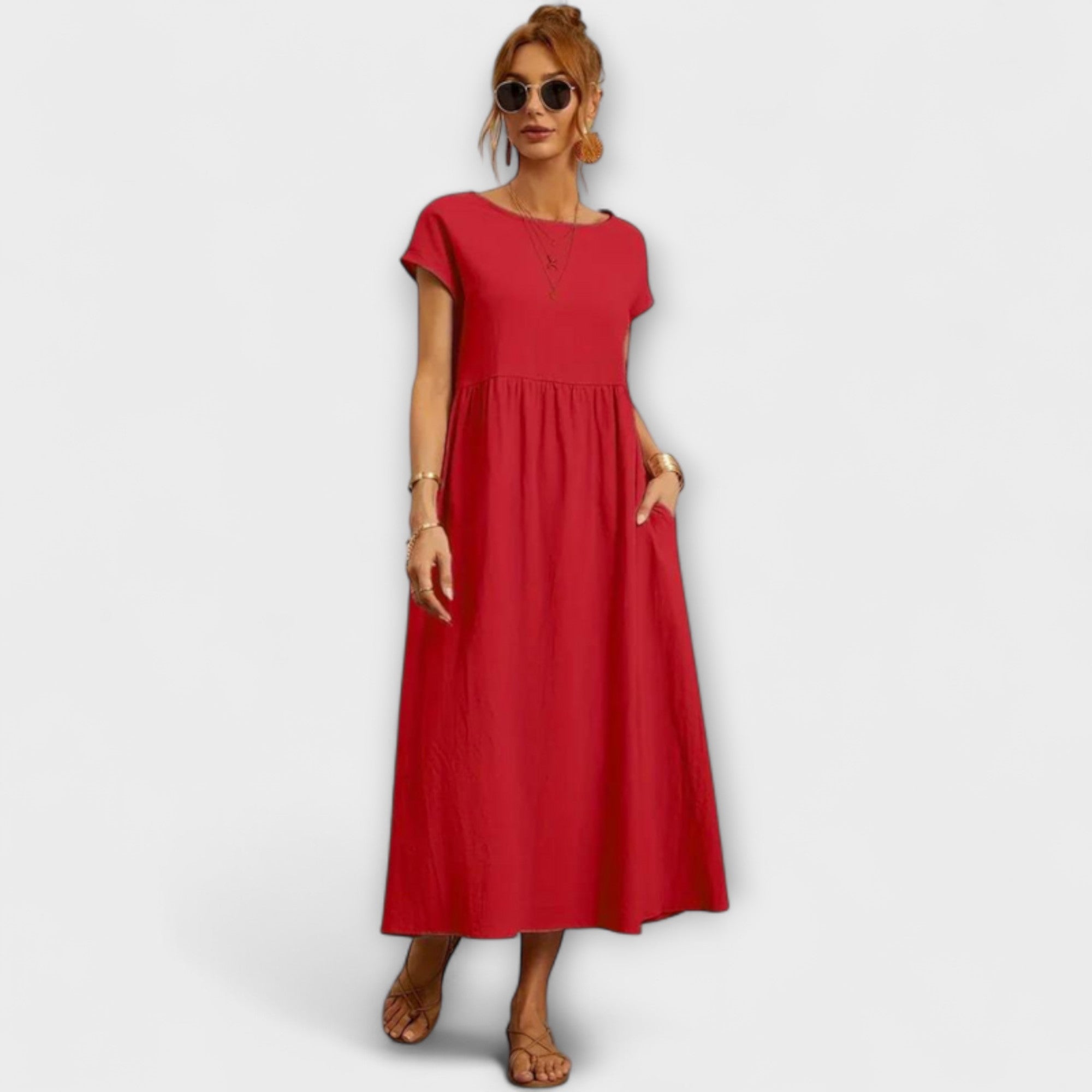 Rotes Midikleid mit kurzen Ärmeln, Raffung am Rocksaum und weitem, leichtem Fall
