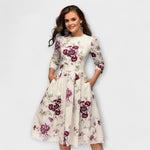 Retrozo knielanges Kleid, cremefarben mit violetten Blumen, 3/4-Ärmel, A-Linie vorne