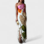 Elegantes Patchwork-Maxikleid mit schrägem Träger und mehrfarbigen Applikationen, asymmetrischer Saum