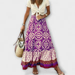 Hochtaillierter Sommerrock mit Paisley-Muster in Lila und Creme, Volantsaum am Saum