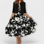 Midi-Kleid mit Blazeroptik, schwarz mit weißem Blumenmuster, ausgestellter Rock