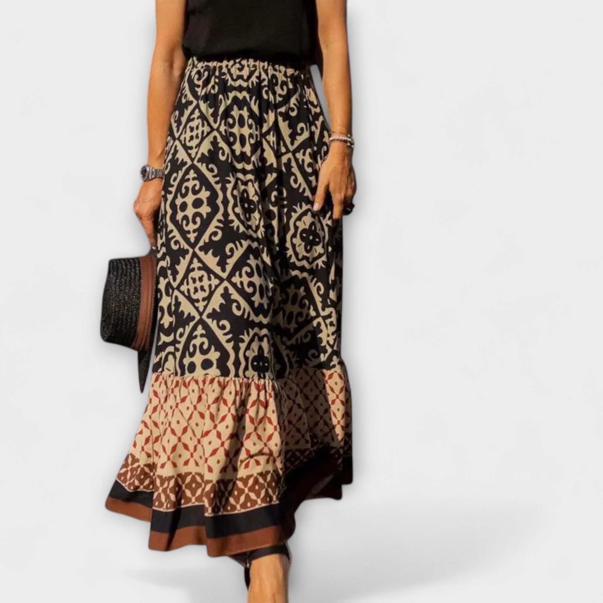 Hochtaillierter Sommerrock mit Paisley-Muster in Schwarz, Creme und Braun, Volantsaum
