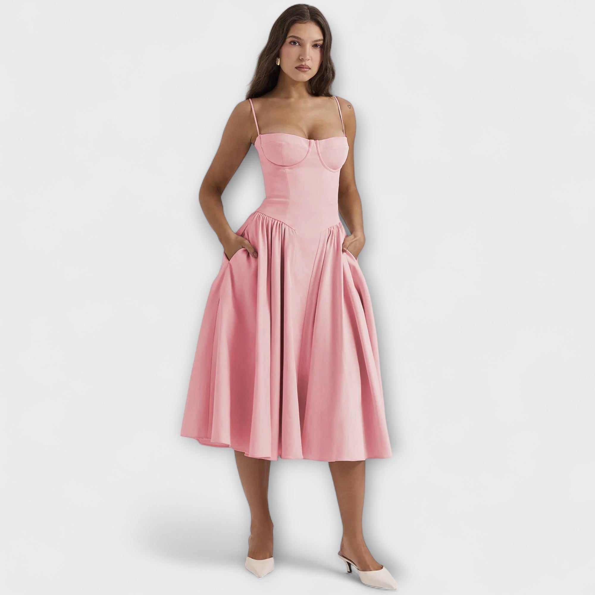 Ärmelloses Korsettkleid in rosa mit schmalen Trägern und gerafftem Faltenrock