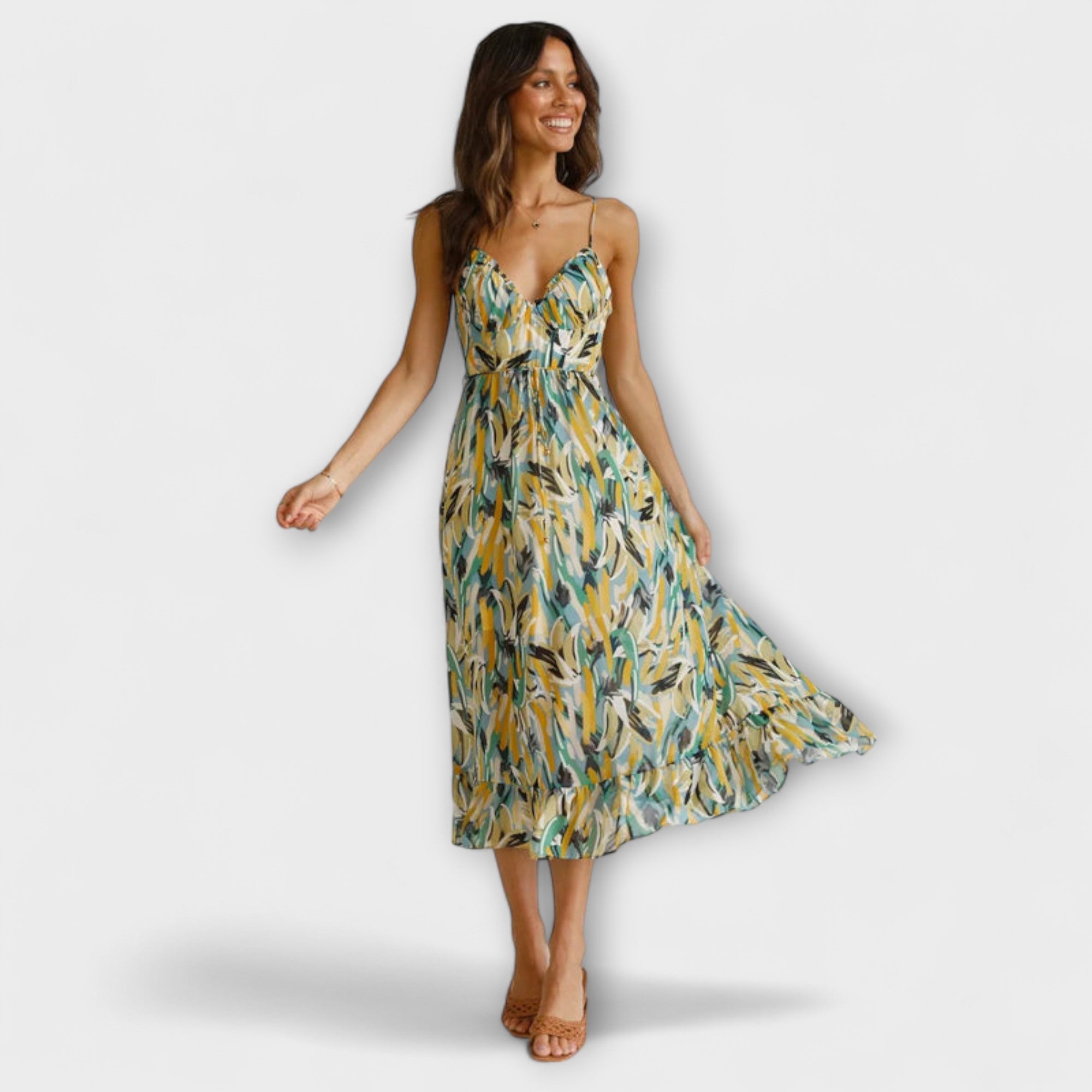 Sommerkleid mit Spaghettiträgern, blau-gelb-grünes Blattmuster, geraffter Rock