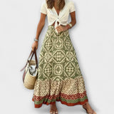 Hochtaillierter Sommerrock mit Paisley-Muster in Oliv und Creme, Volantsaum am Saum
