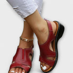 Orthopädische Ledersandalen in Rot mit Kette, offenen Zehen und gepolsterter Ferse