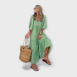 Grünes Maxikleid mit V-Ausschnitt und Rauten-Gittermuster, Glockensaum